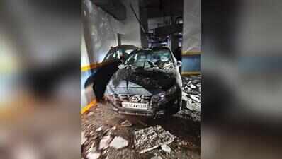 Car crushed as ceiling caves in at condo