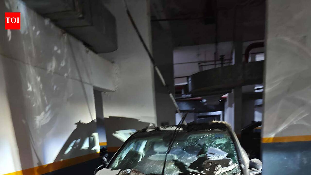 Car crushed as ceiling caves in at condo