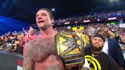 CM Punk returns to WWE on RAW; shockingly wins World title after 15 years