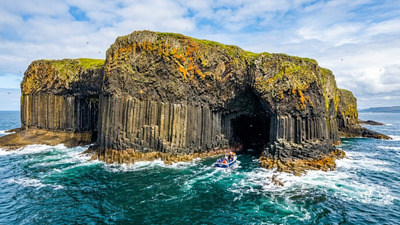 Scotland's Fingal's Cave is a 60-million-year-old volcanic wonder where Atlantic Ocean creates haunting natural music