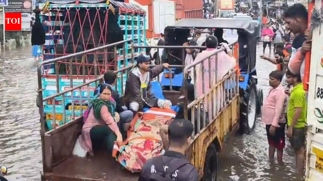 Doctor and his tractor rush to aid of woman in labour in flooded Nalasopara