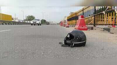 Woman dies as truck hits bike near trailer crash site