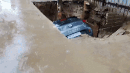 Monsoon mayhem: Ghaziabad road caves in after heavy rain; car, scooter plunge into ditch