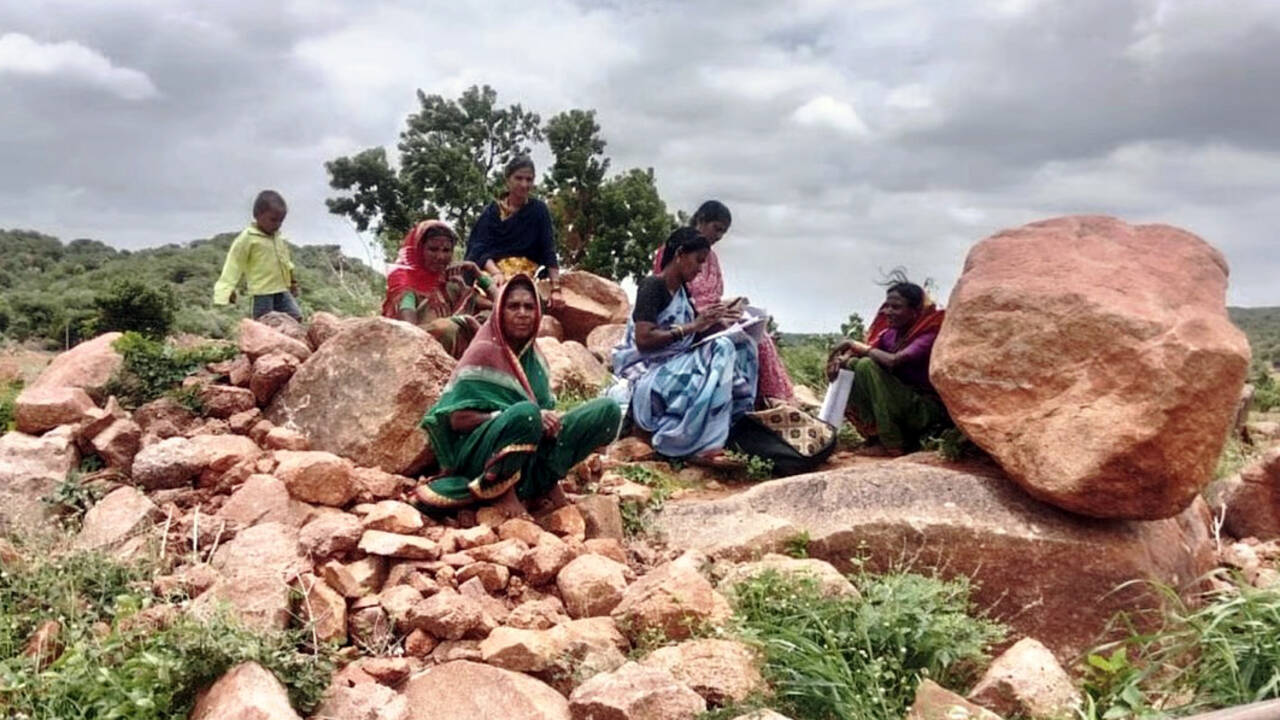 Officials trek hill for mobile signal during SIR drive