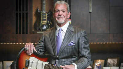 A late NFL owner’s collection sold for more than $105 million, with one guitar fetching $14.55 million