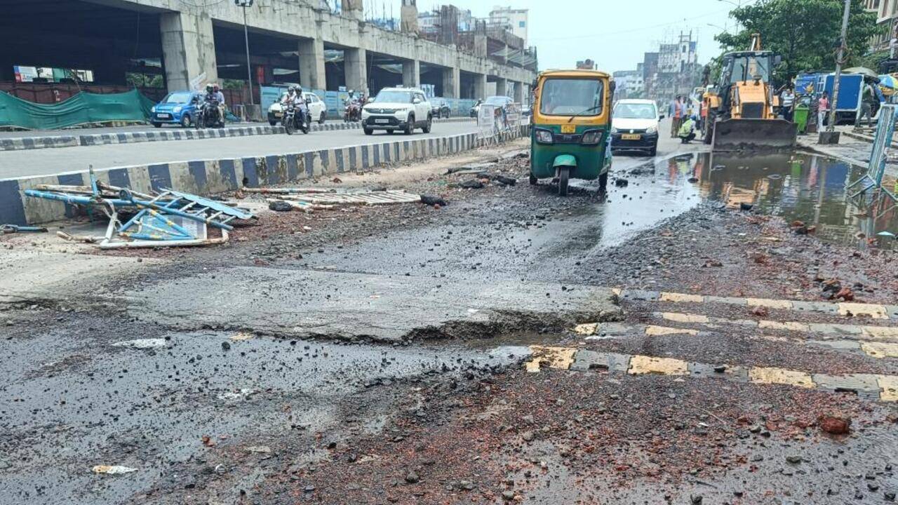 Airport access becomes a pain as receding rainwater leaves potholes in wake