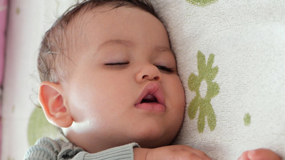 Does your child sleep with an open mouth? Here's what it could mean and when parents should be concerned