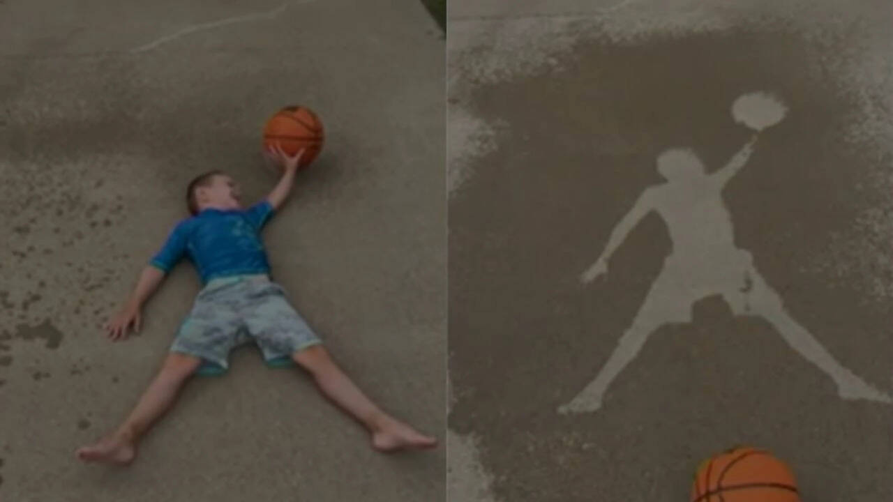 An Iowa mom used a garden hose and objects from her garage to entertain her sons; the idea has now crossed 28 million views
