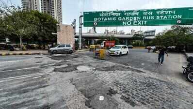 Noida repairs damaged speed breakers at Botanical Garden bus stand