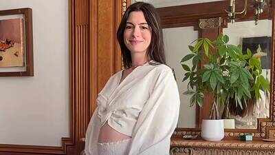 anne-hathaway-says-she-was-shocked-to-learn-she-was-pregnant-with-baby-no-3-were-calling-this-one-our-buzzer-beater.jpg