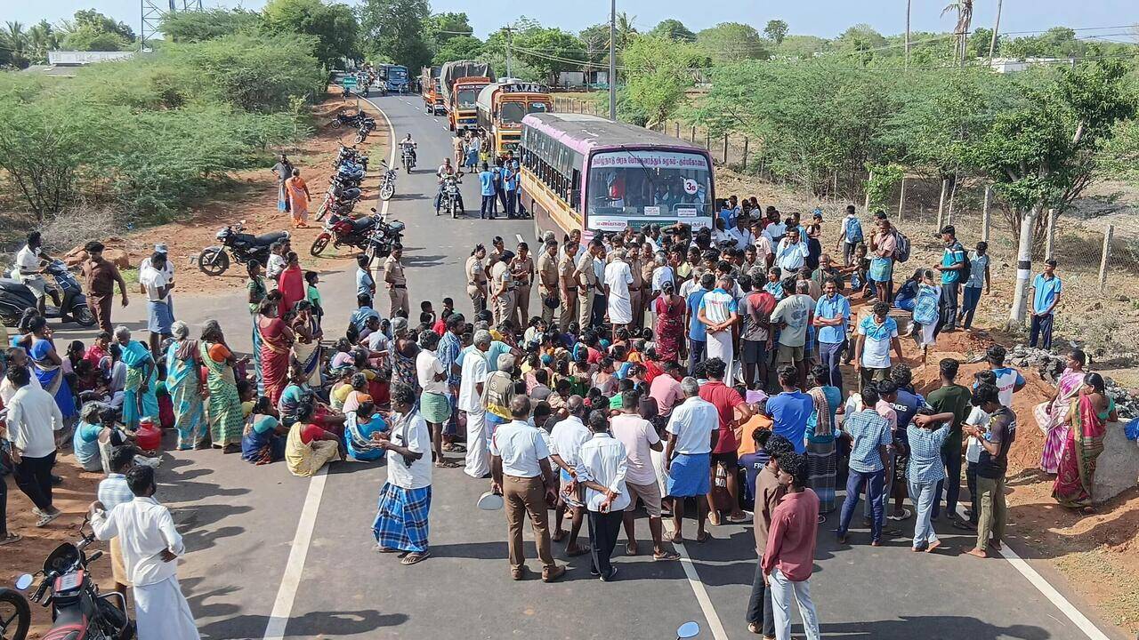 Residents block road against renaming village