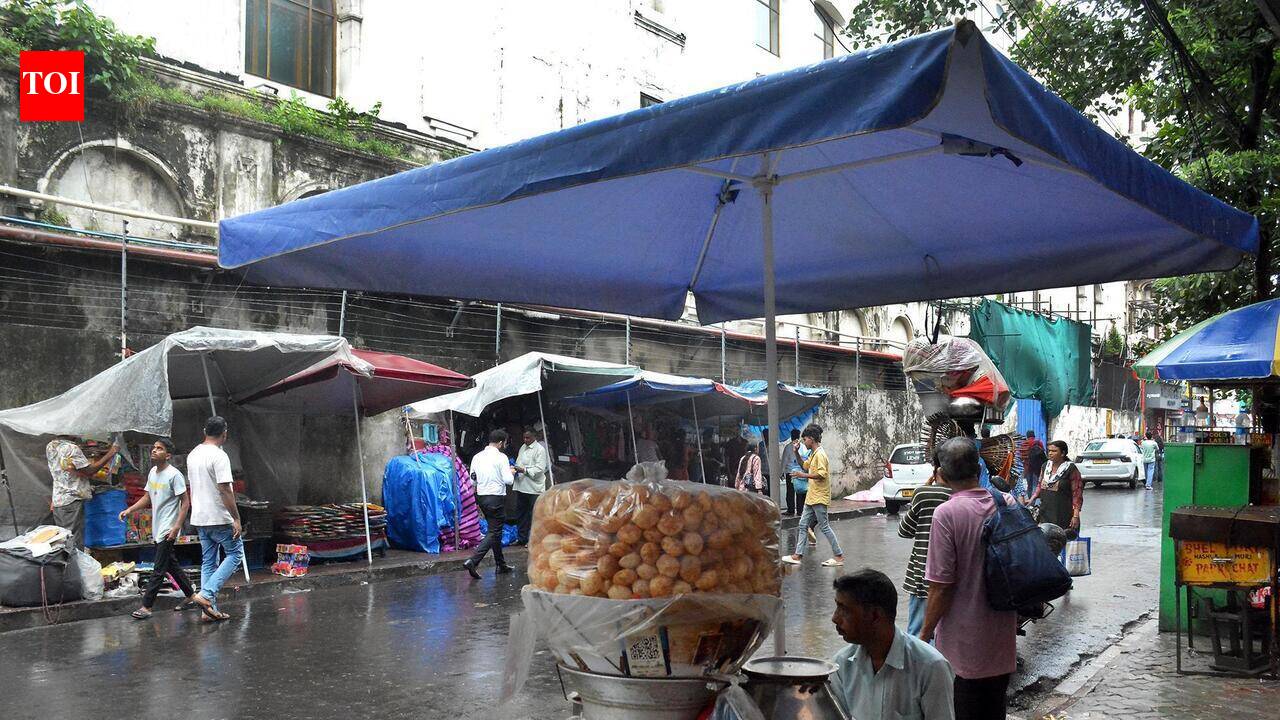Hawkers return to New Market area with smarter square parasols