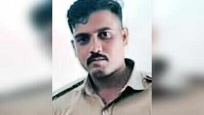 Probationary PSI held for dowry harassment, bid to kill wife