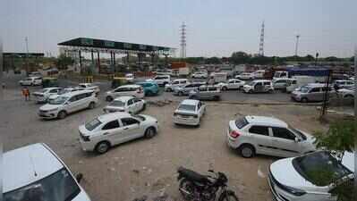 Cabs, trucks parked at Sirhaul toll chokes Udyog Vihar’s entry, eway link