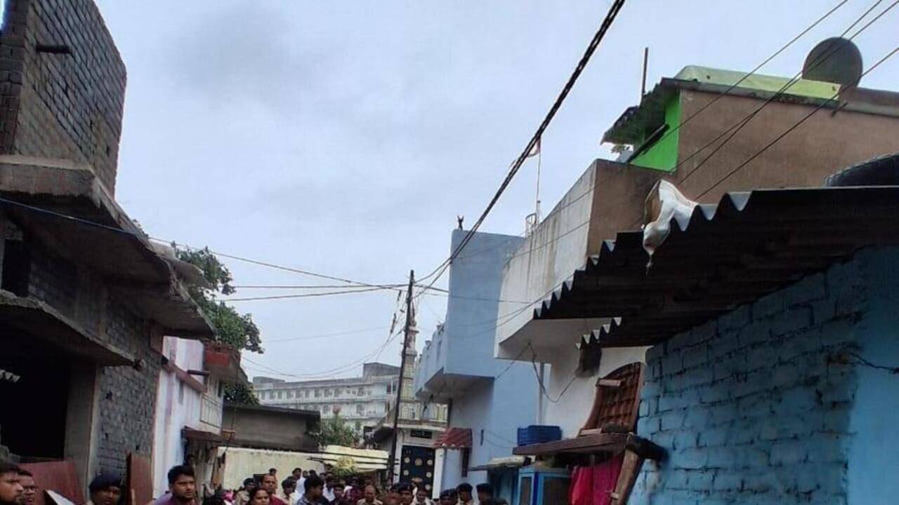 RMC razes 23 illegal structures over drain to prevent waterlogging