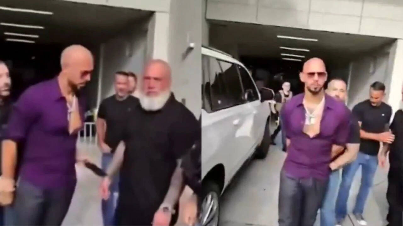 Watch: Andrew Tate appears to pass phone to team member during US arrest