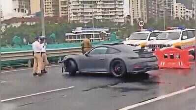 Speeding Porsche hits divider, car on Coastal Road, girl injured