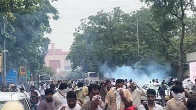 CJP Parliament march: Tear gas shells fired as protesters attempt to breach barricades near Shastri Bhawan; security intensified across central Delhi