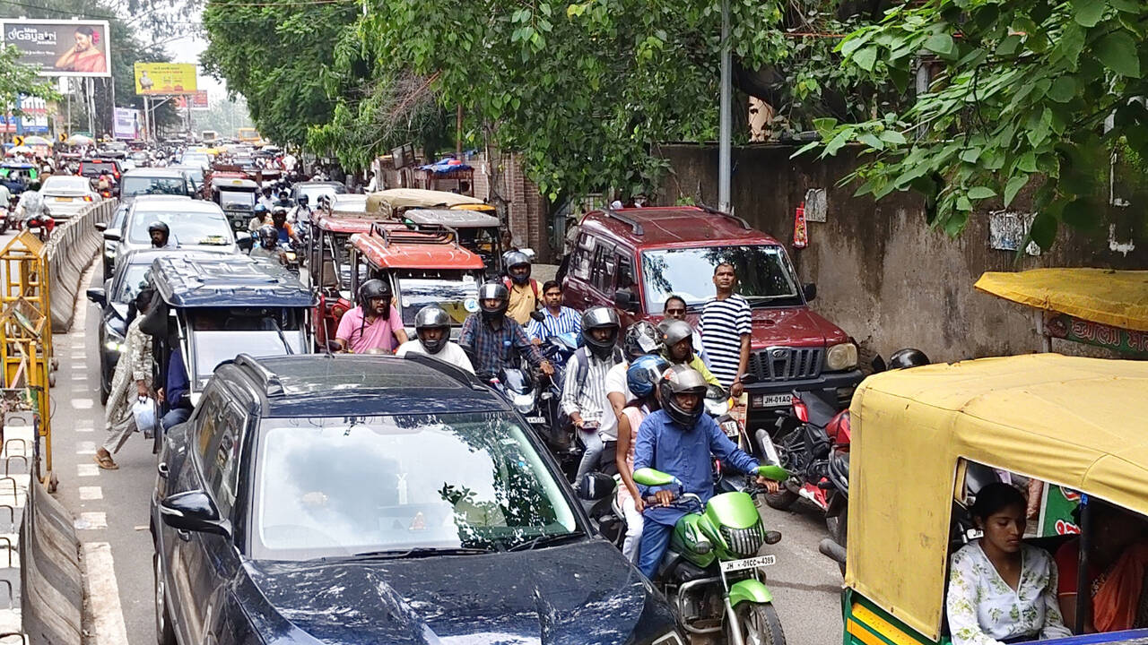 Rainfall, protests trigger severe traffic gridlock across city