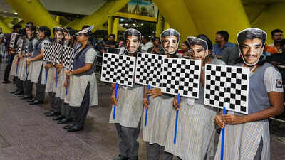 chennai-school-students-hold-chess-board-designed-placards-to-welcome-candidate.jpg