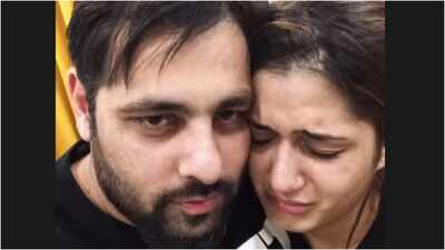 In an unseen photo, a tearful Isha Rikhi leans on Badshah's shoulder and says, 