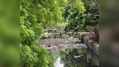 Choked with garbage, drains spilling sewage back onto roads, say residents