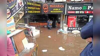 Traders count losses as rain batter markets