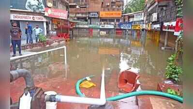 Traders count losses as rain batter markets