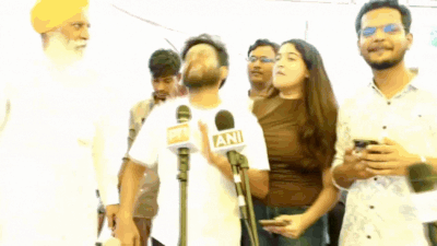 Watch: CJP's Abhijeet Dipke falls on stage after being told Dharmendra Pradhan has resigned