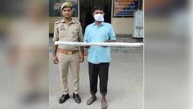 A month on, man held for killing son after fight over liquor
