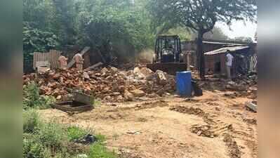 Houses, walls built on protected forest land demolished