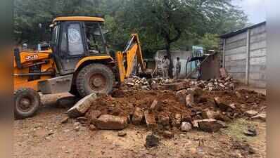 Houses, walls built on protected forest land demolished
