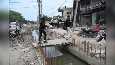 Outside condos, along roads: A gaping risk waiting for next victim in Noida