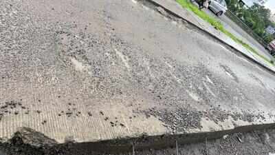 Potholes appear on new highway service road a month after completion, residents raise quality concerns