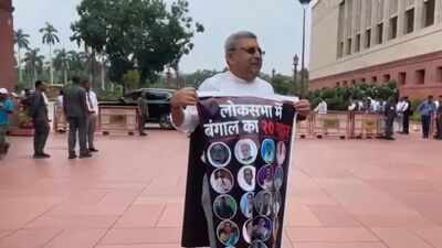 '20 traitors of Bengal': TMC's Kalyan Banerjee wears poster with rebel MPs' photos in Parl, seeks swift ECI decision