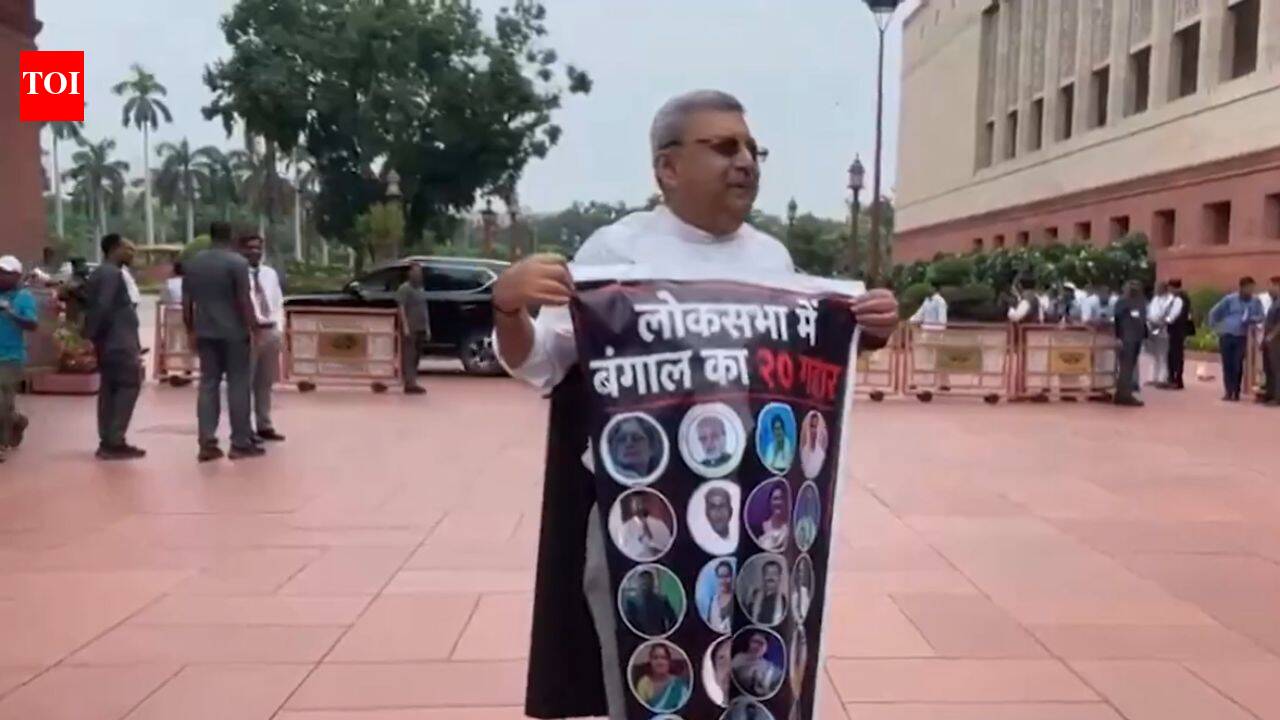 TMC's Kalyan Banerjee wears poster with 20 rebel MPs' photos in Parliament