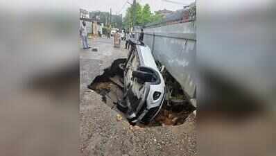 Car plunges into crater as Gurdev Nagar road caves in; driver escapes