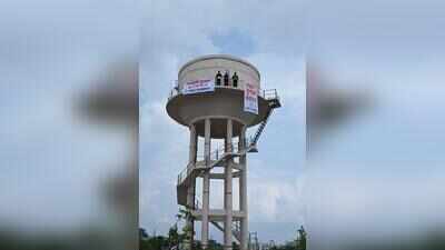 NSUI protesters climb water tank, demand Shah’s resignation, student polls