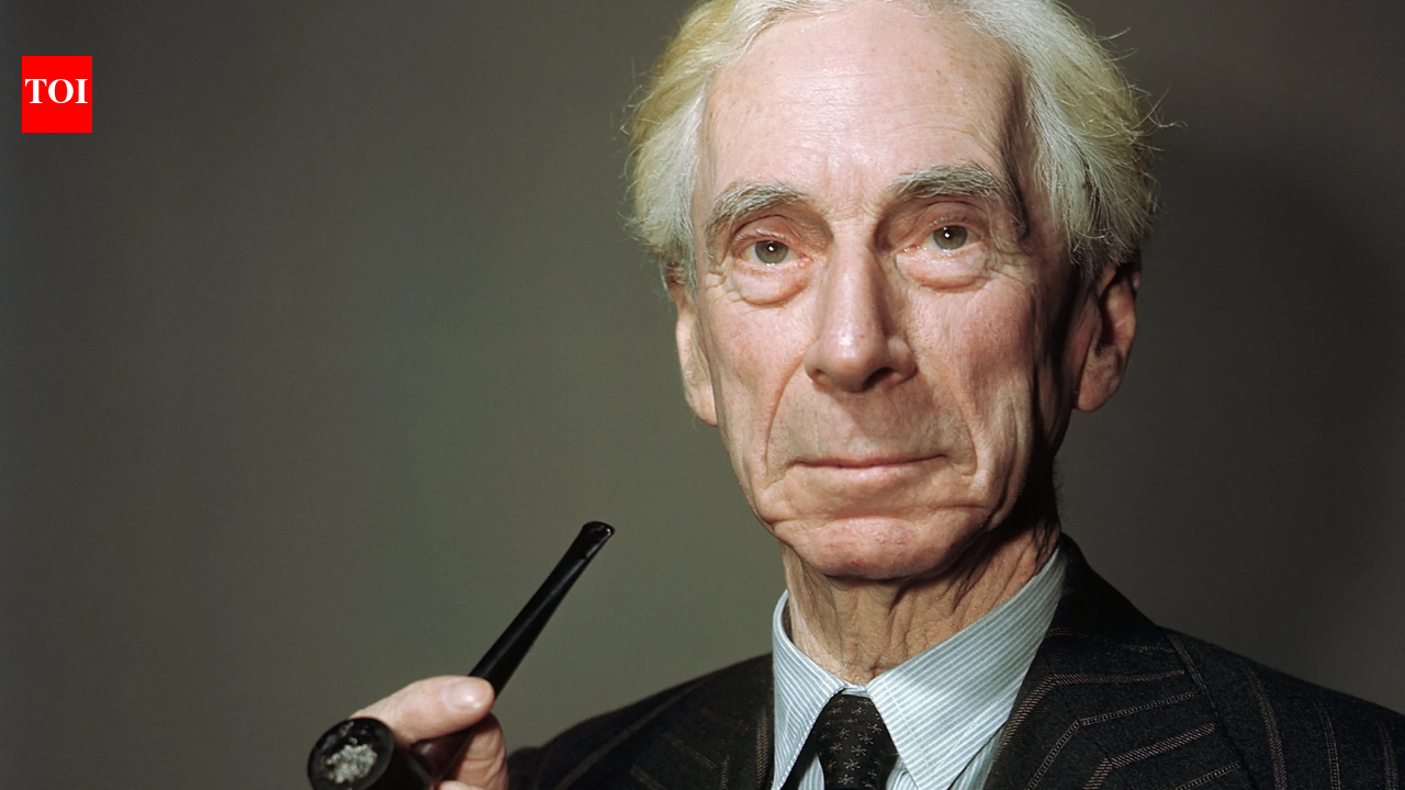 Quote by Bertrand Russell: 'There are two motives for reading a book; one, that you enjoy it...'