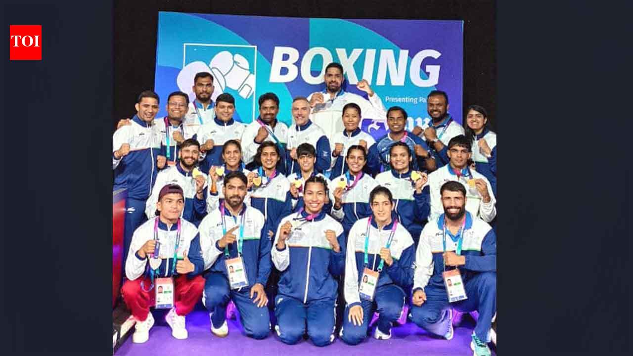 It's not Olympics, but these are good medals: Boxing coach Nieva