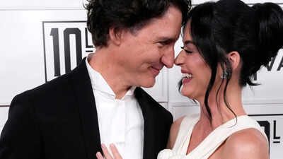 Katy Perry and Justin Trudeau share a passionate kiss on beach date as they mark a year of dating - PICS