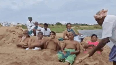 Watch: Tamil Nadu farmers hold dramatic sand-burial protest, demand immediate Cauvery water release