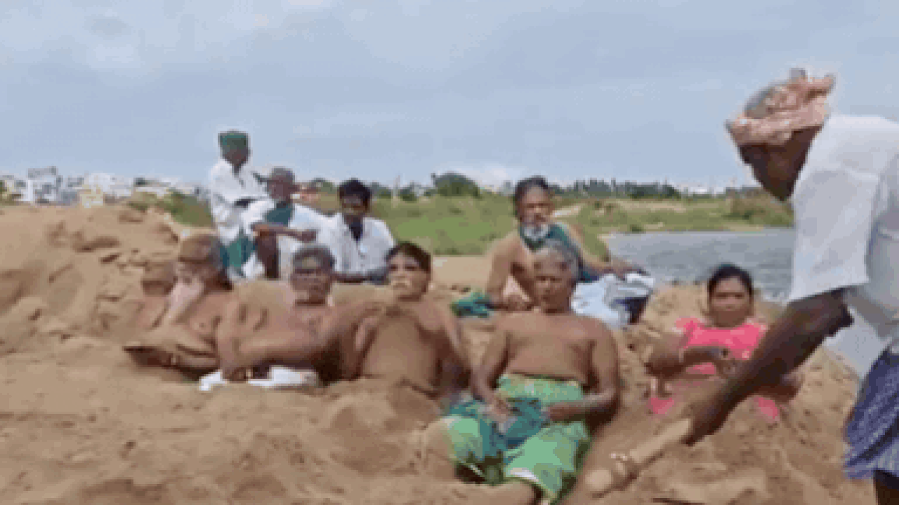 Watch: Tamil Nadu farmers hold dramatic sand-burial protest, demand immediate Cauvery water release