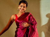 Anupama Parameswaran lets her oversized silver jhumkas do all the talking with her elegant silk saree