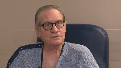 A stranger's quick action brought this 77-year-old grandpa back after he 'died' on a flight