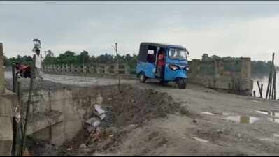 Washed-away bridge approach road in Radhuram Chariali threatens connectivity loss