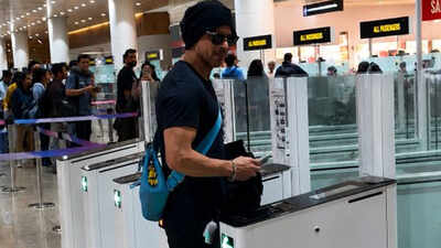 Shah Rukh Khan SPOTTED at London airport; sparks frenzy at immigration counter - WATCH