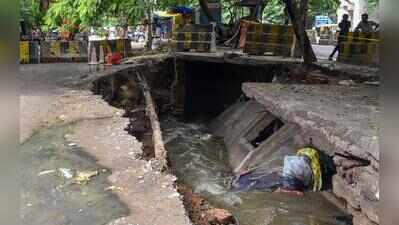 Rain triggers drain slab collapse, service road caves in