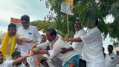 Cabinet berth demand heats up in Haveri, supporter’s petrol drama stuns protest