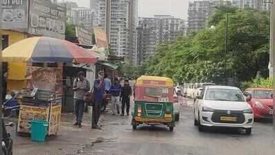 Illegal parking, dhabas and garages choke access to Emerald Floors Premier in Gurgaon
